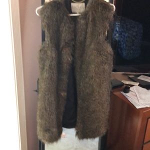 Long  faux-fur vest.